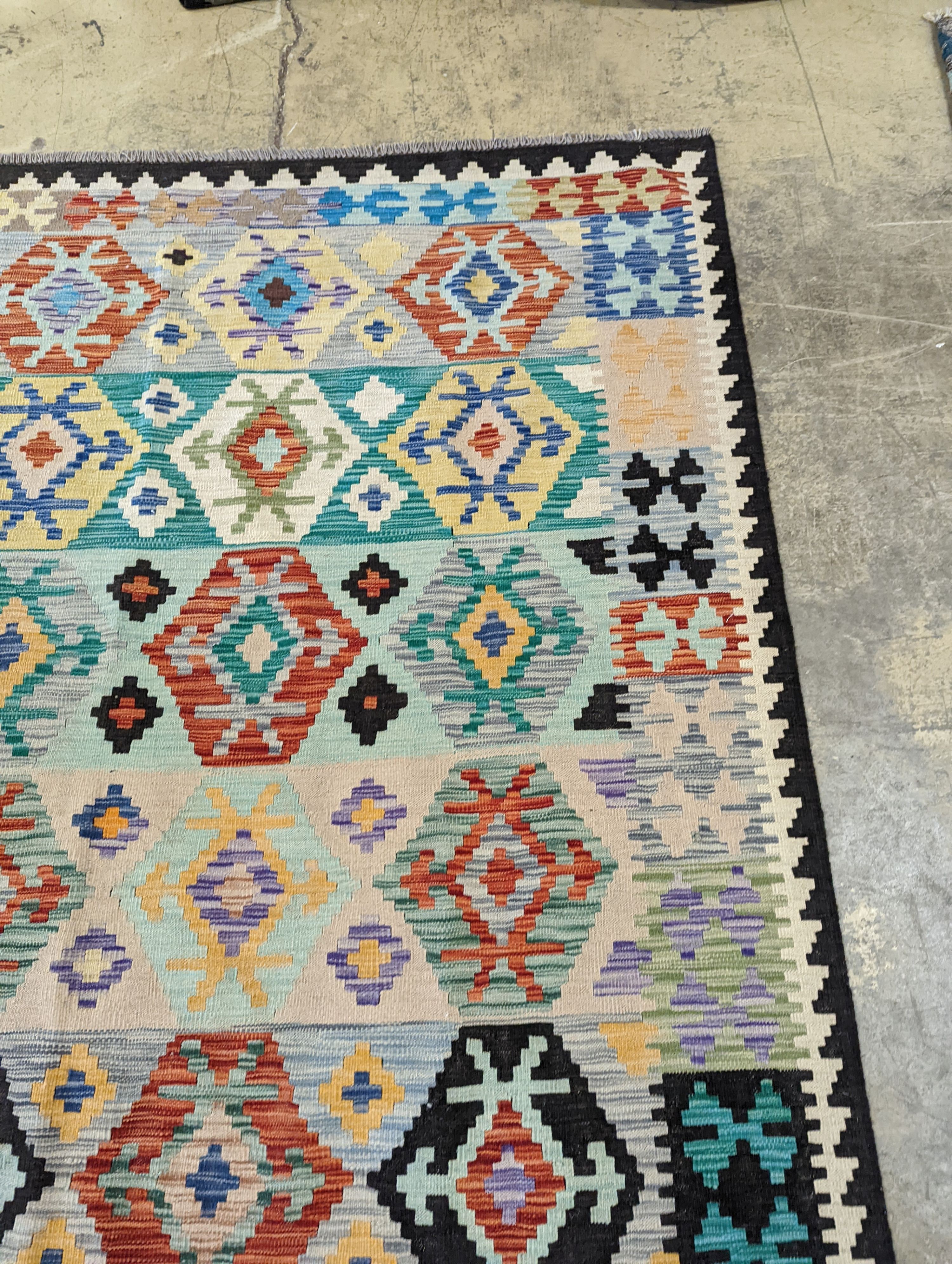 An Anatolian contemporary Kelim polychrome flatweave carpet, 300 x 204cm